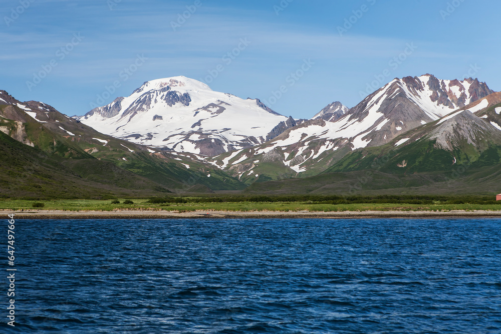 View Of The Mountains Along The Coastline; False Pass, Alaska, United States Of America View Of The Mountains Along The Coastline; False Pass, Alaska, United States Of America