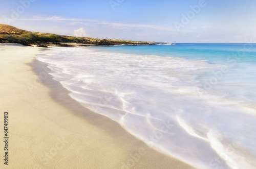 Morning Surf At Kua Bay Beach Park; Island Of Hawaii, Hawaii, United States Of America photo