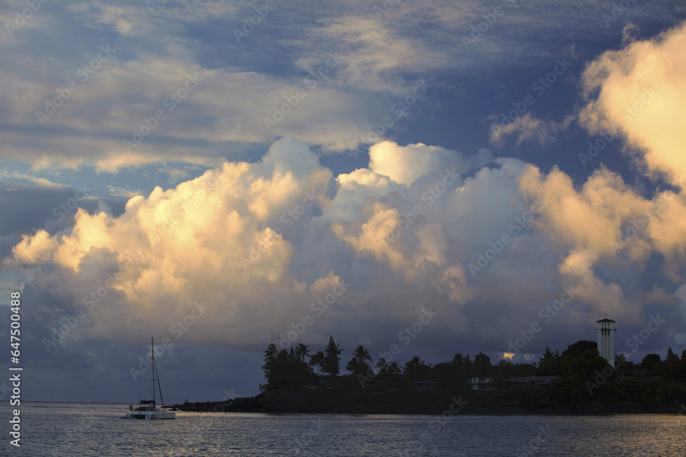 Hawaii, Oahu, Waimea Bay, A Moody Evening With Puffy Clouds. Hawaii, Oahu, Waimea Bay, A Moody Evening With Puffy Clouds.
