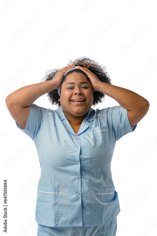 young latin afro woman with blue medical uniform showing how to put hair tie on her head young latin afro woman with blue medical uniform showing how to put hair tie on her head
