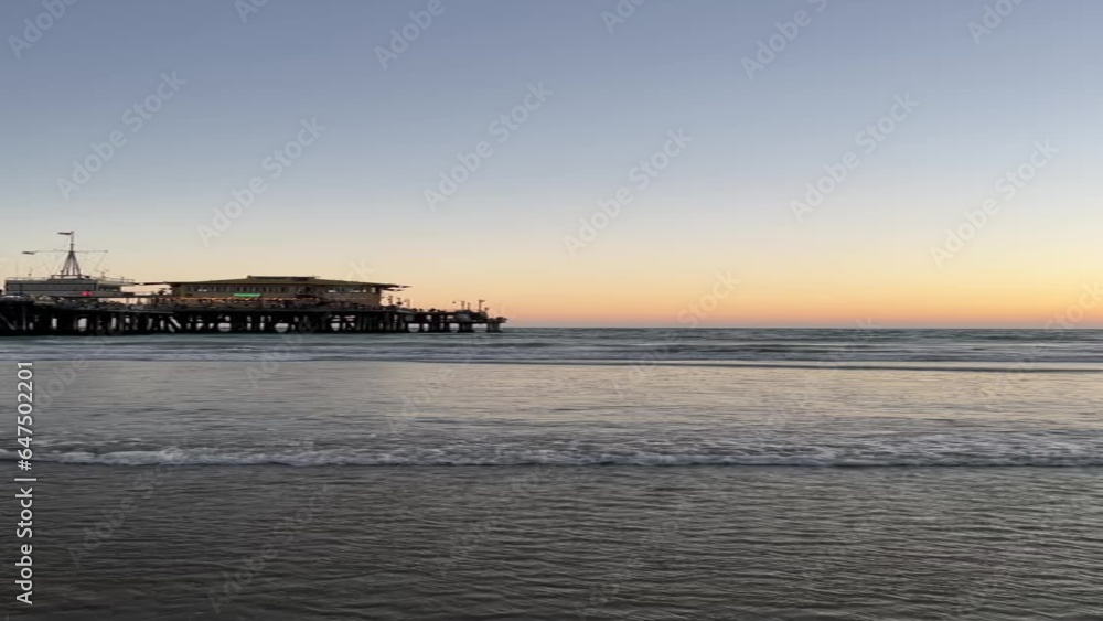 sunset over the sea looking towards the pier vertical video sunset over the sea looking towards the pier vertical video