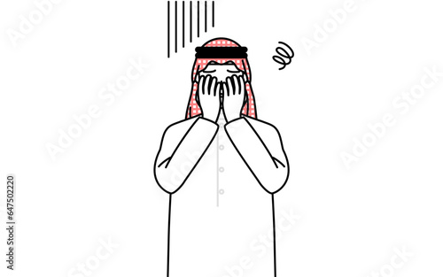 落ち込んで顔を覆うイスラムのシニア男性
