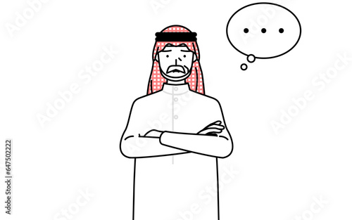 腕を組んで考えるイスラムのシニア男性