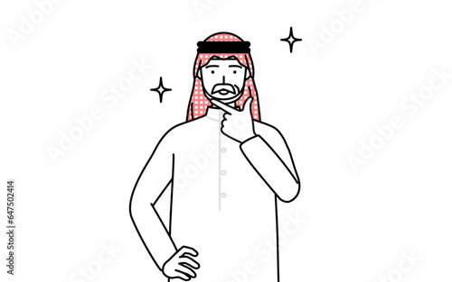 自信家のポーズを取るイスラムのシニア男性