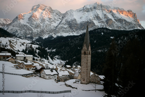 Twilight falls on the Ladin village of LaValle in the Dolomites; Wengen, Italy photo