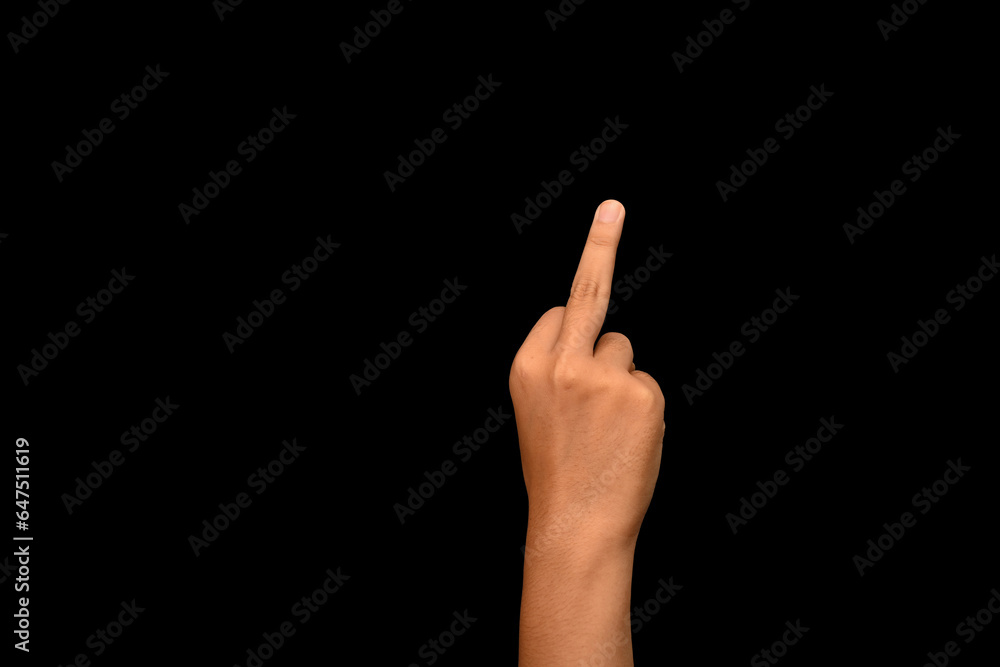 Man showing middle finger on black background. Bad expression, provocation, rude attitude and offensive gesture Man showing middle finger on black background. Bad expression, provocation, rude attitude and offensive gesture