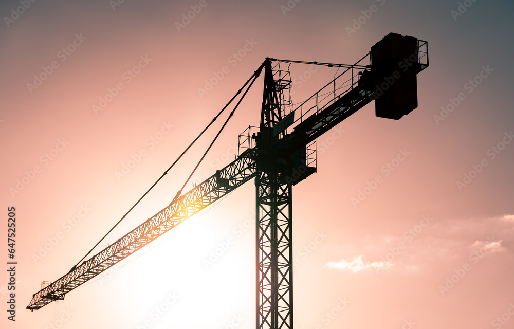 construction crane against the sky sunset view construction crane against the sky sunset view