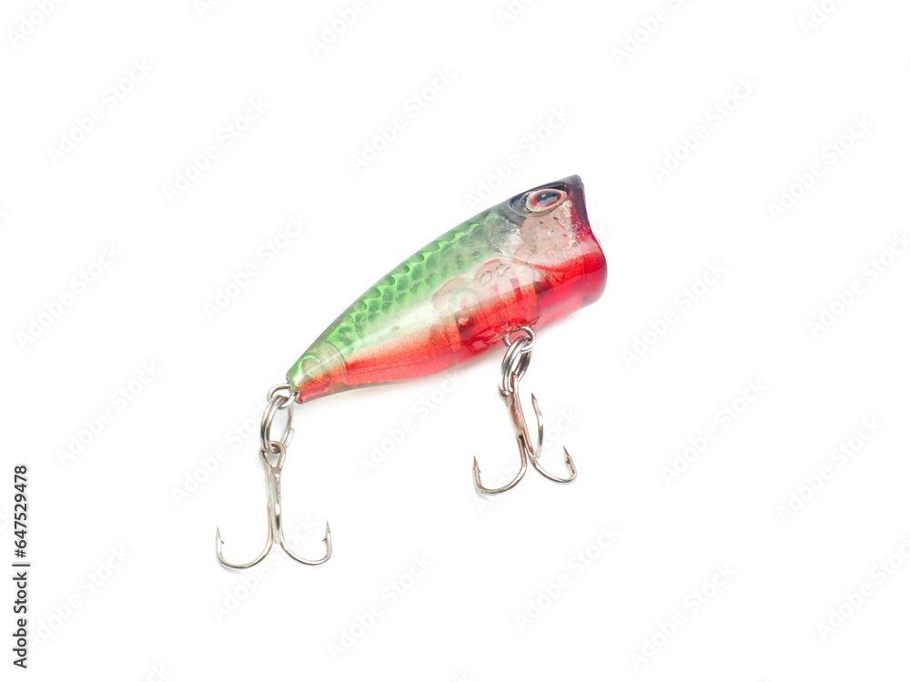 Picture of colorful fish shaped plug baits with 3 way hooks. Fishing equipment isolated on white background. Picture of colorful fish shaped plug baits with 3 way hooks. Fishing equipment isolated on white background.