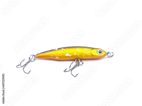 Picture of colorful fish shaped plug baits with 3 way hooks. Fishing equipment isolated on white background.