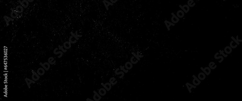 Black grunge dust and scratches distressed design, dark black dust and scratches on a black background.