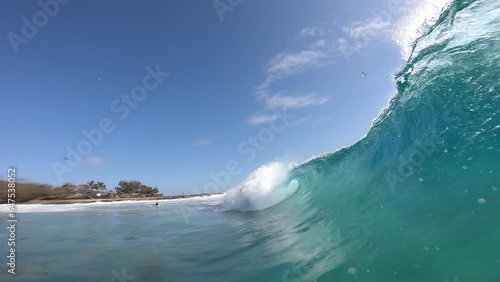 Slow mo of wave barreling into closeout at Froggies Beach in Coolangatta on the Gold Coast Australia photo