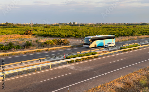 Bus on highway. Tour Bus driving on highway road. Public transport for traveling. Bus travel in Europe. Passenger bus on motorway. Transportation of passengers by public transport by road