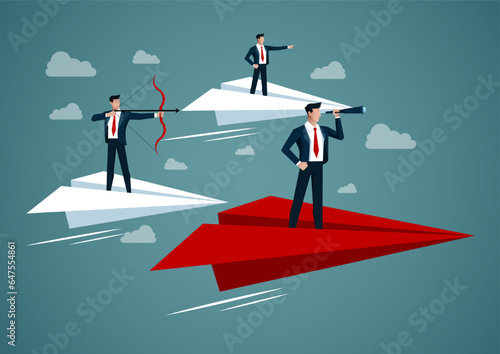 Business people looking for target to shooting arrow for achievement success