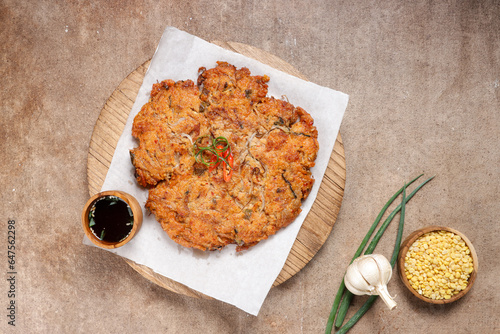 Nokdujeon or Nokdu Bindaetteok is a Savory Korean Pancake Made With Ground Mung Beans. photo