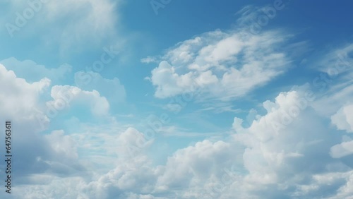 Cloud motion in blue sky, seamless looping video animated background. photo