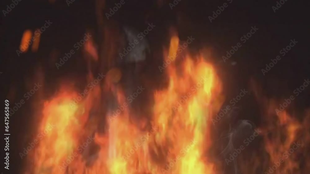 Flames of fire and particle on black background, Fire Sparks, blast isolated on black background, seamless and looping animation Flames of fire and particle on black background, Fire Sparks, blast isolated on black background, seamless and looping animation