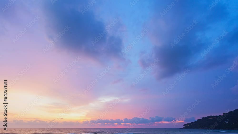 time lapse colorful reflection of stunning sunset..beautiful scene with the sun painting the sky above waves .breaking gently on a sandy.Gradient sweet color. abstract nature background. time lapse colorful reflection of stunning sunset..beautiful scene with the sun painting the sky above waves .breaking gently on a sandy.Gradient sweet color. abstract nature background.