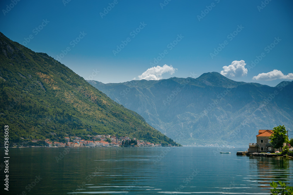 Picturesque view of a beautiful Bay of Kotor with big mountains on a background