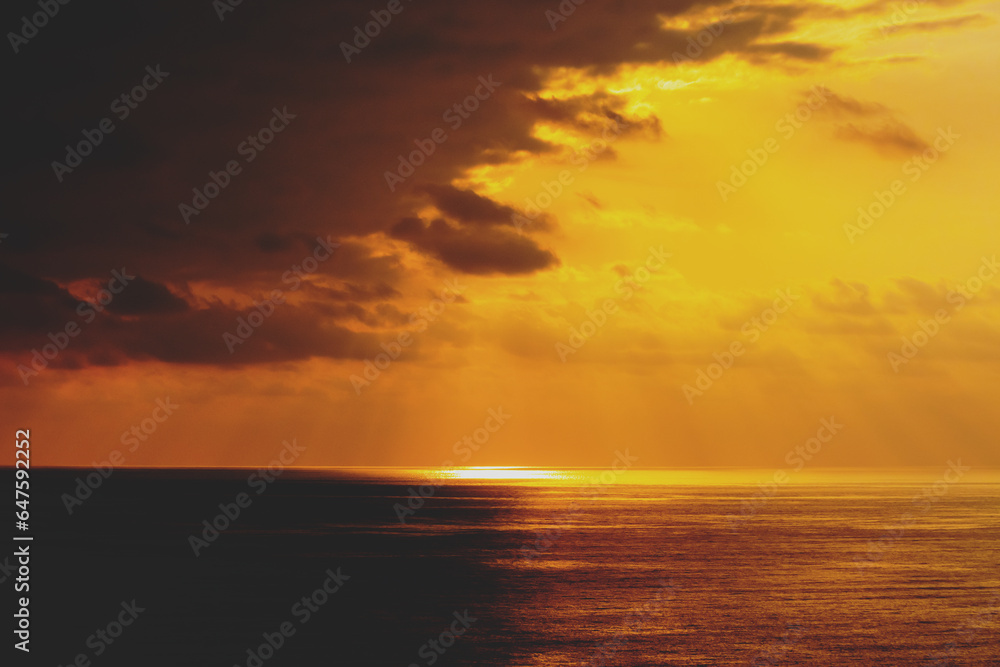 Seascape in the evening, beautiful golden sunset over calm sea. Nature landscape