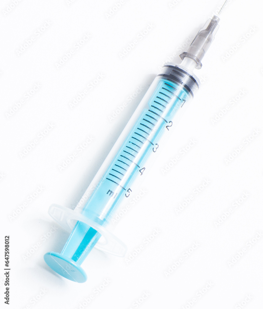 Disposable plastic syringe prepared for injection and vaccination in the hospital. The concept of medicine and health Disposable plastic syringe prepared for injection and vaccination in the hospital. The concept of medicine and health