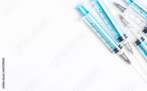 Disposable plastic syringe prepared for injection and vaccination in the hospital. The concept of medicine and health photo
