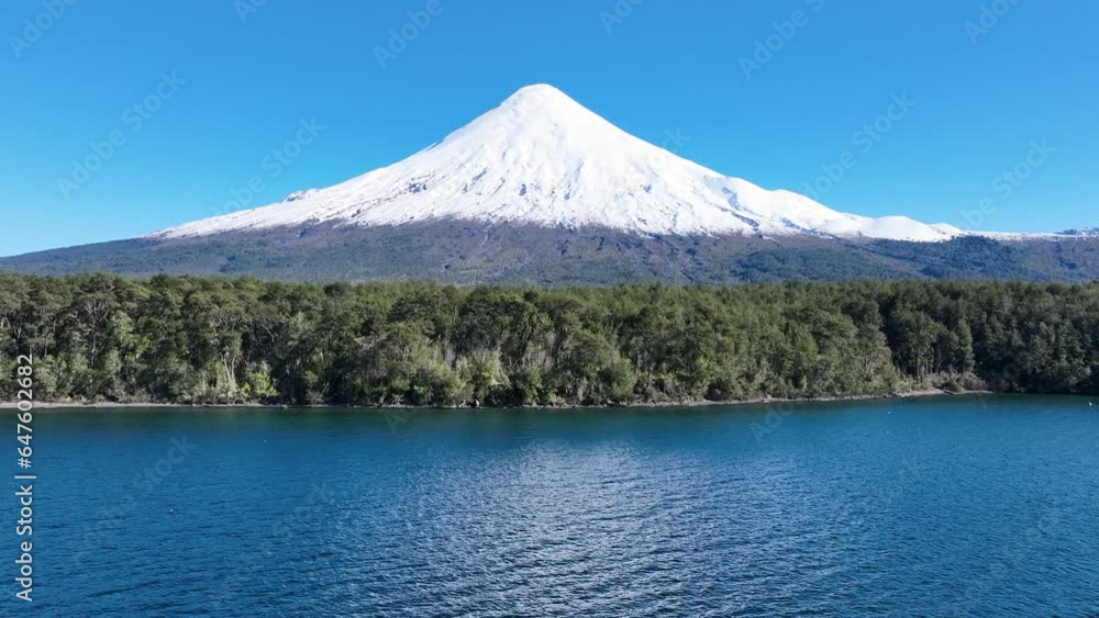 Osorno Volcano At Petrohue In Los Lagos Chile. Volcano Landscape. Sky Clouds Background. Los Lagos Chile. Snowcapped Mountain. Osorno Volcano At Petrohue In Los Lagos Chile. Osorno Volcano At Petrohue In Los Lagos Chile. Volcano Landscape. Sky Clouds Background. Los Lagos Chile. Snowcapped Mountain. Osorno Volcano At Petrohue In Los Lagos Chile.