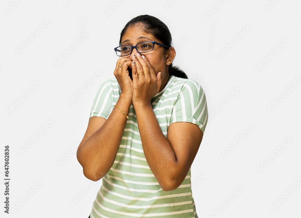 Woman Afraid Closing Mouth with Both Hands on White Background Woman Afraid Closing Mouth with Both Hands on White Background