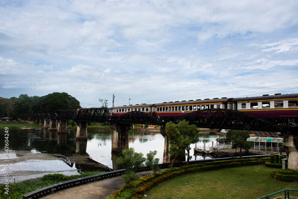 Steel railway bridge over river kwai of landmarks memorials historical sites and monuments World War II Sites for thai people foreign travelers travel visit and train running in Kanchanaburi, Thailand