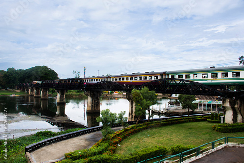 Steel railway bridge over river kwai of landmarks memorials historical sites and monuments World War II Sites for thai people foreign travelers travel visit and train running in Kanchanaburi  Thailand