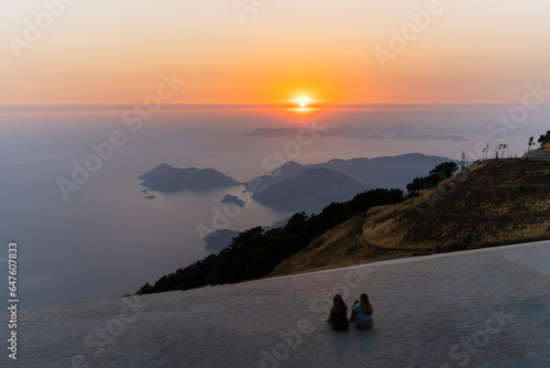 Fototapeta Naklejka Na Ścianę i Meble -  
Ölüdeniz, like its name, is a calm lake. On the stormiest days, while Belcekız coasts are battling with waves, Ölüdeniz only flutters. After enjoying the sea during the day, we recommend you to watch