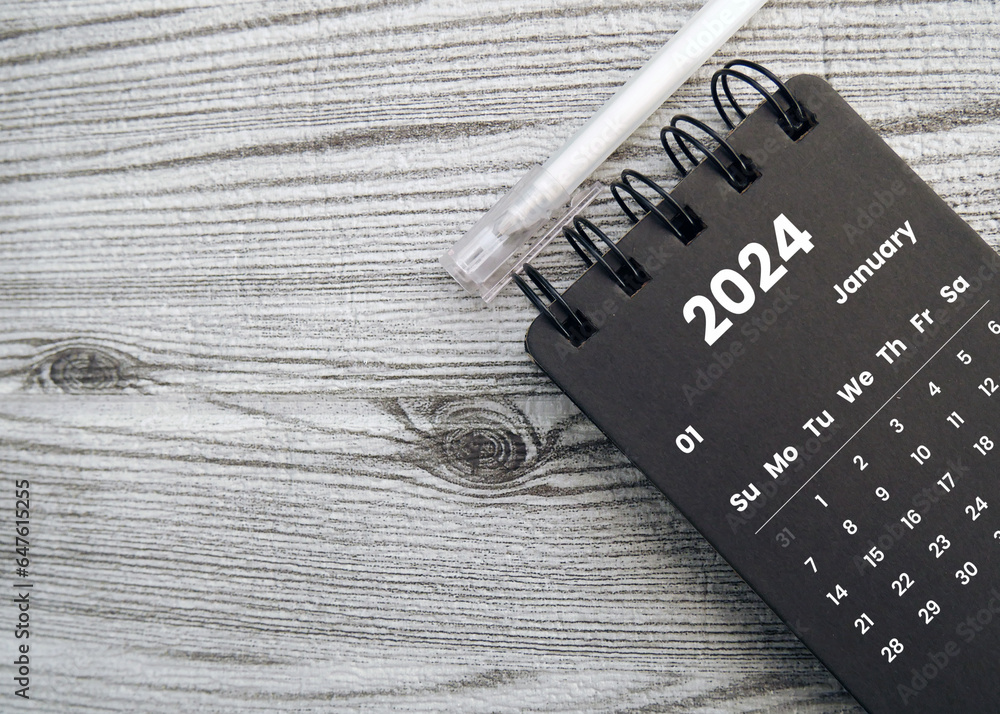 January 2024 Monthly black desk calendar for 2024 year on beautiful