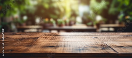 Blurred background of wooden table close up © AkuAku