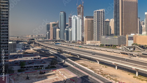 Dubai Marina skyscrapers and Sheikh Zayed road with metro railway aerial timelapse, United Arab Emirates © neiezhmakov