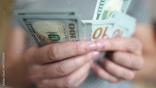 dollar money. bankrupt man counting money cash. business crisis finance dollar concept. close-up of a hand counting paper dollars. exchange finance economy lifestyle dollar usd