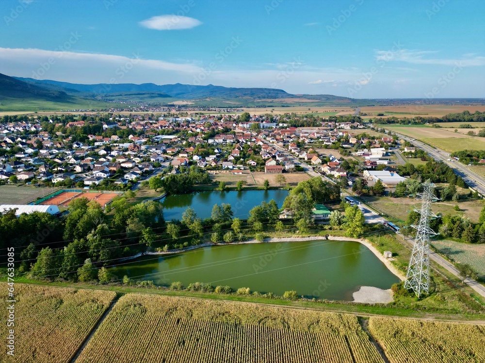 Aerial Panorama of Issenheim Village and Daweid Pond and Corn Fields, Alsace 2023: A Contested Landscape Between Rural Tradition and Urban Expansion