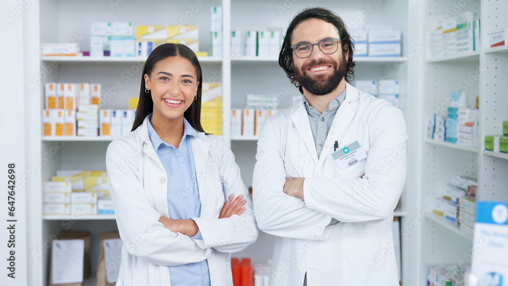 Crossed arms, pharmacy and portrait of people with smile for medical care, service and healthcare. Professional, teamwork and man and woman pharmacist for medication, medicine and clinic dispensary Crossed arms, pharmacy and portrait of people with smile for medical care, service and healthcare. Professional, teamwork and man and woman pharmacist for medication, medicine and clinic dispensary