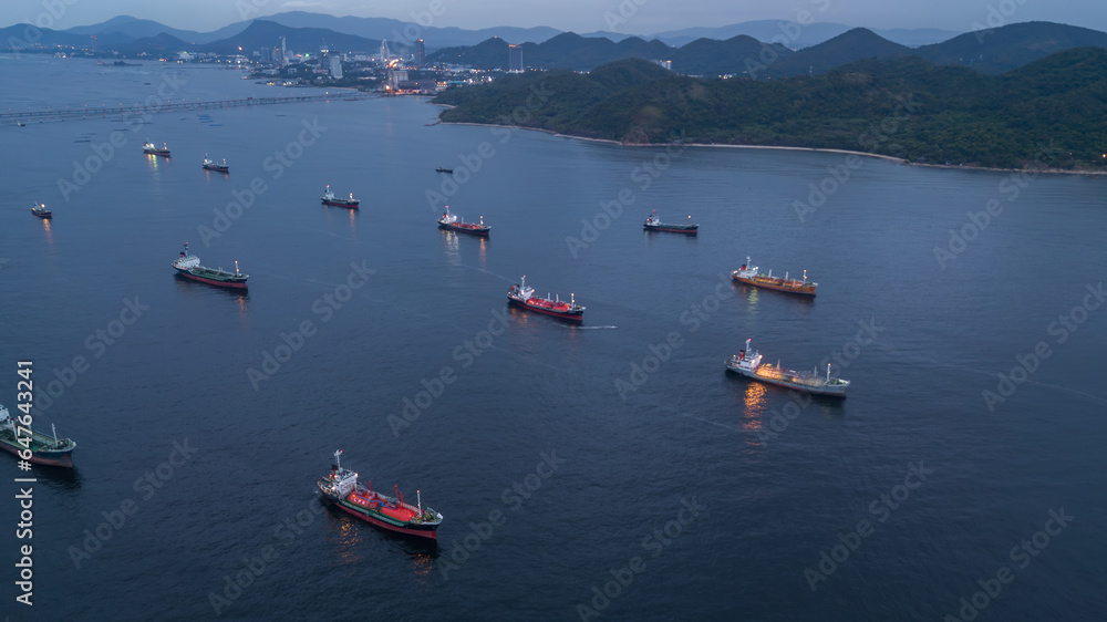 Obraz premium Aerial view oil chemical tanker at sea, Industrial crude oil and fuel tanker ship in deep blue ocean sea.