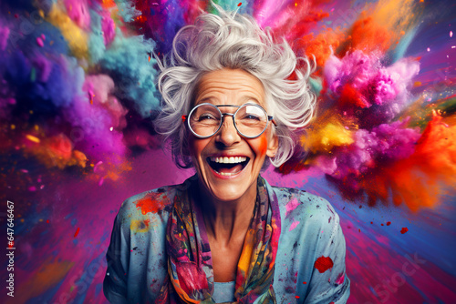 smiling older woman painting with colours smoke in background. Mature artist enjoyment. Elderly hobby