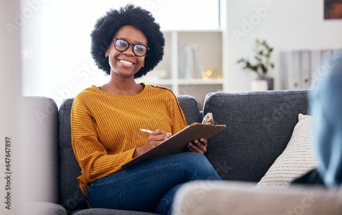 Quadro su tela Black woman therapist on sofa with notes, smile and patient for advice and psychology, listening and mental health care help