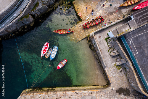 Aerial Top Down View of Boats on the Colliemore Harbour, Dalkey, Ireland. photo