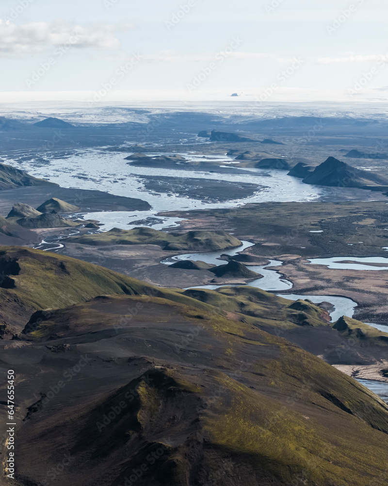 Aerial view of a beautiful mountain landscape with river at sunset, Kirkjubaejarklaustur, Southern region, Iceland. Aerial view of a beautiful mountain landscape with river at sunset, Kirkjubaejarklaustur, Southern region, Iceland.