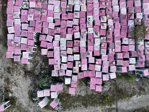 Aerial view of a phone box graveyard, a storage and dismantling facility for old phone boxes in Brandenburg, Germany. photo