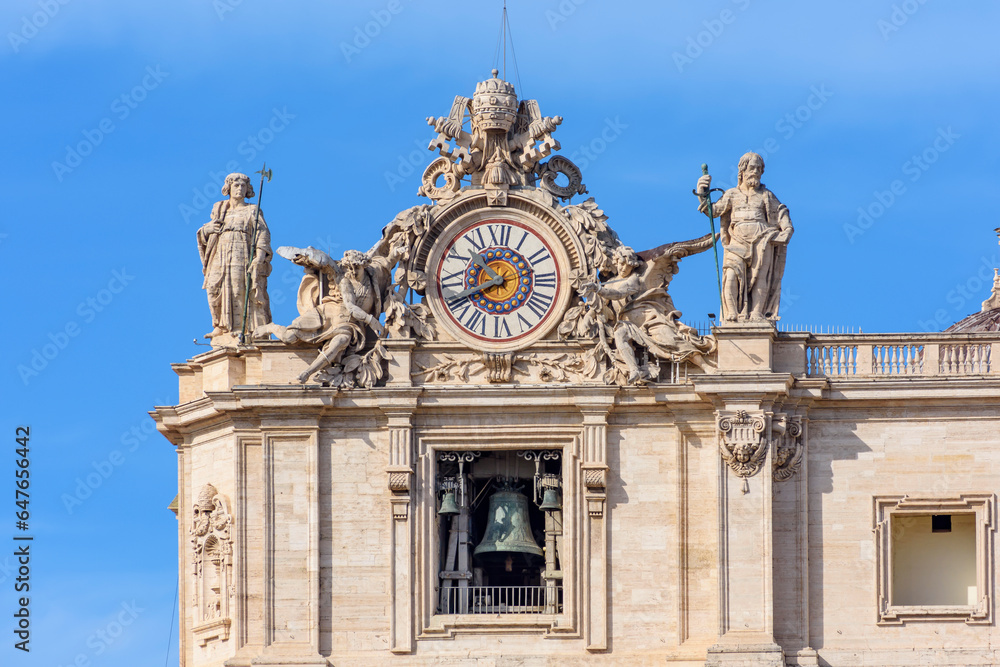 Clock on St. Peter's basilica facade in Vatican