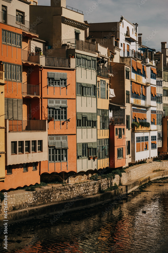 Naklejka premium houses on the river bank