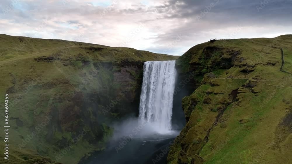 Aerial of Skogafoss waterfall at sunrise in Iceland during summer Aerial of Skogafoss waterfall at sunrise in Iceland during summer