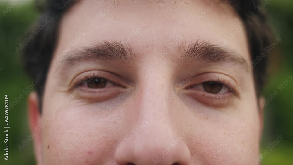 Close-up portrait of a biracial young man. Brown eyes of a young guy close-up, natural beauty. Close-up portrait of a biracial young man. Brown eyes of a young guy close-up, natural beauty.