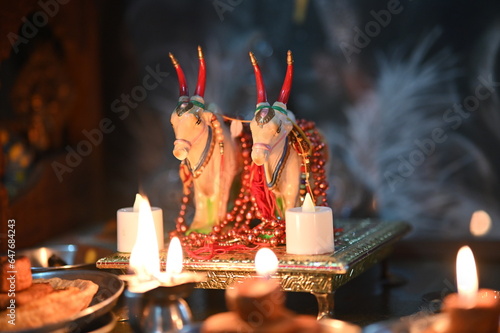 Bulls with decoration and lighting for worship. Bull statue. Bull Festival. Pola Festival. Pongal Festival. Indian Culture. Hindu holiday season  photo