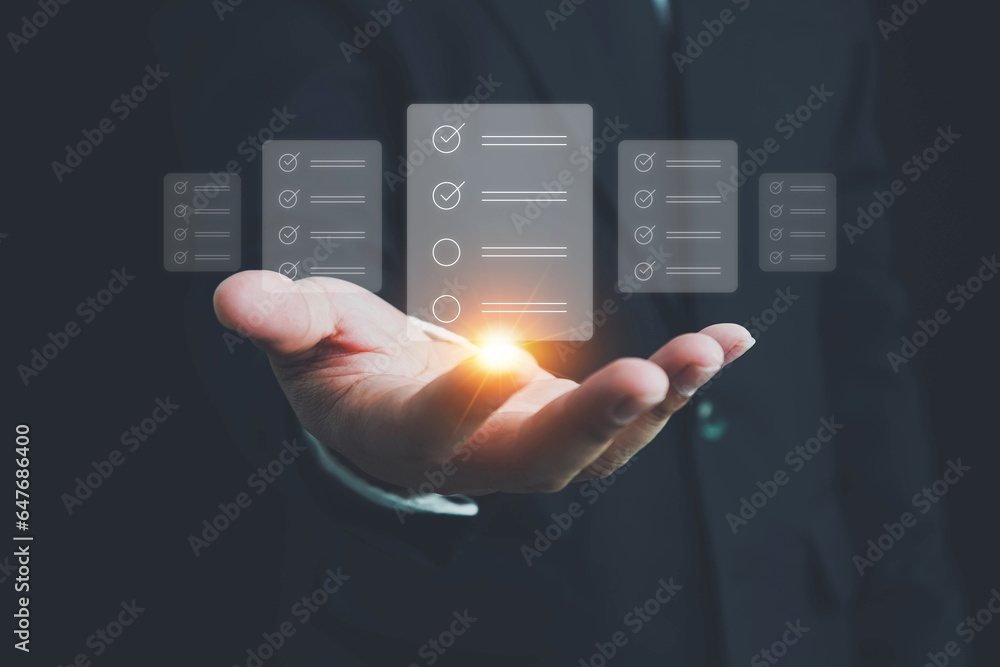 Business performance checklist, Quick checklist and clipboard management concept, job applicants, businessman hand shows doing online checklist survey,Employees must complete the online survey form. Business performance checklist, Quick checklist and clipboard management concept, job applicants, businessman hand shows doing online checklist survey,Employees must complete the online survey form.