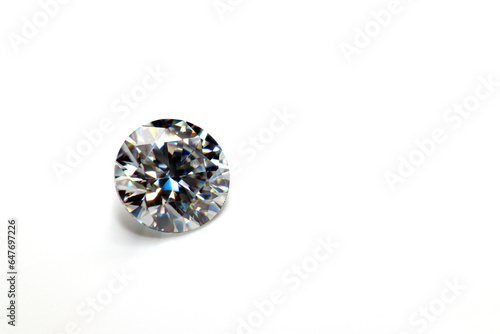 Konstfotografi Moissanite diamond simulant on white background with space show double refractio