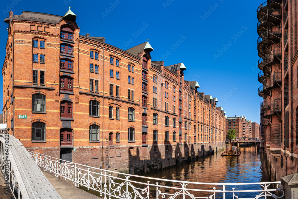 Hamburg, Germany. The Warehouse District (German: Speicherstadt. The largest warehouse district in the world is located in the port of Hamburg within the HafenCity quarter.